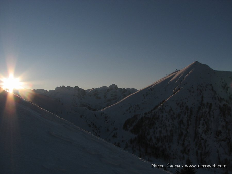 05_Spunta il Sole dietro al Becco e al Valgussera.jpg